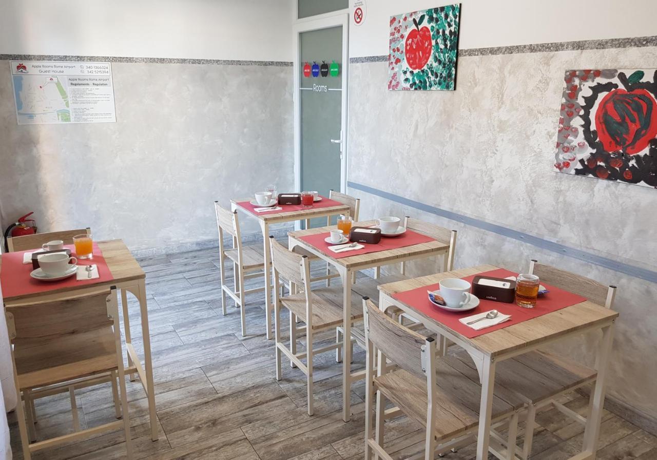 Apple Rooms Rome Airport Fiumicino Kültér fotó A typical dining room in a shelter